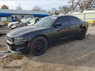 2016 Dodge Charger SXT with VIN 2C3CDXJG7GH140806, listed as a Copart auction lot 82644634 with 104,299 mi miles and Salvage Title. Bid and sale history available at carsss.com. Image 1.