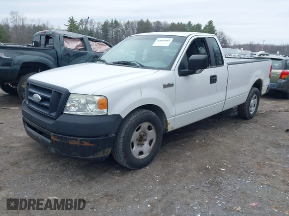 2007 Ford F-150 XL with VIN 1FTRF12257NA47662, listed as a IAAI auction lot 42003991 with 154,502 mi miles. Bid and sale history available at carsss.com. Image 2.