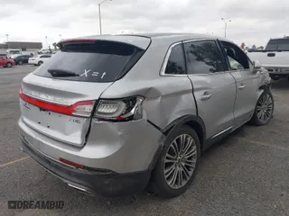 2016 Lincoln MKX Reserve with VIN 2LMTJ8LR3GBL52307, listed as a IAAI auction lot 35271548 with 55,940 mi miles. Bid and sale history available at carsss.com. Image 4.