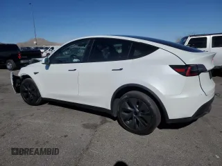 2025 Tesla Model Y Long Range with VIN 7SAYGDED2SA373756, listed as a Copart auction lot 49866835 with 3,318 mi miles and Salvage Title. Bid and sale history available at DreamBid. Image 2.