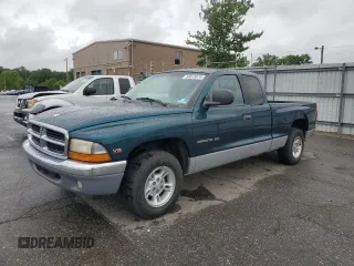 1999 Dodge Dakota SLT z VIN 1B7GL22X8XS268188, wystawiony jako Copart lot #58015675 z przebiegiem 164 998 mil mil oraz Szkoda całkowita • Salvage title. Historia ofert i sprzedaży dostępna na DreamBid. Obrazek 1.