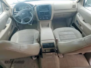 2002 Ford Explorer XLS with VIN 1FMZU62E62UA69368, listed as a Copart auction lot 61571065 with 124,095 mi miles and Salvage title. Bid and sale history available at DreamBid. Image 8.