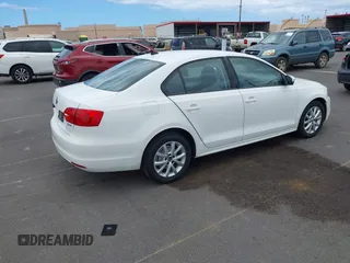 2012 Volkswagen Jetta SE z VIN 3VWDP7AJ7CM350057, wystawiony jako IAAI lot #42499732 z przebiegiem 92 203 mil mil oraz . Historia ofert i sprzedaży dostępna na DreamBid. Obrazek 4.