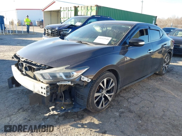 2016 Nissan Maxima Platinum with VIN 1N4AA6AP4GC434534, listed as a IAAI auction lot 41642540 with 143,413 mi miles and . Bid and sale history available at DreamBid. Image 2.