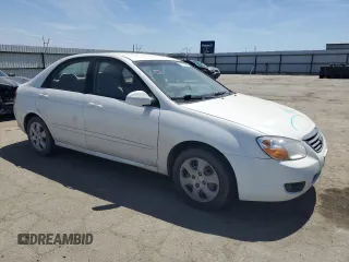 2009 Kia Spectra EX with VIN KNAFE222895593609, listed as a Copart auction lot 53918335 with 139,113 mi miles and Salvage Title. Bid and sale history available at carsss.com. Image 4.