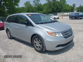 2012 Honda Odyssey EX z VIN 5FNRL5H44CB038825, wystawiony jako IAAI lot #42411401 z przebiegiem 214 164 mil mil oraz . Historia ofert i sprzedaży dostępna na DreamBid. Obrazek 1.