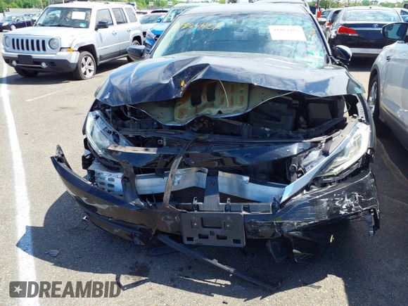 2018 Honda Civic LX with VIN 2HGFC2F54JH548274, listed as a IAAI auction lot 41864457 with 60,905 mi miles and . Bid and sale history available at DreamBid. Image 12.
