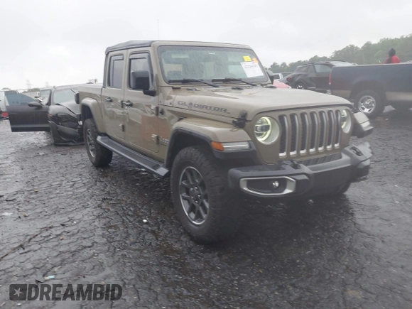 2020 Jeep Gladiator Overland z VIN 1C6HJTFG0LL160699, wystawiony jako IAAI lot #42326325 z przebiegiem 65 639 mil mil oraz . Historia ofert i sprzedaży dostępna na DreamBid. Obrazek 1.