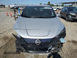 2025 Nissan LEAF SV Plus with VIN 1N4CZ1CV7SC561383, listed as a Copart auction lot 77488484 with 1,565 mi miles and Salvage Title. Bid and sale history available at carsss.com. Image 5.