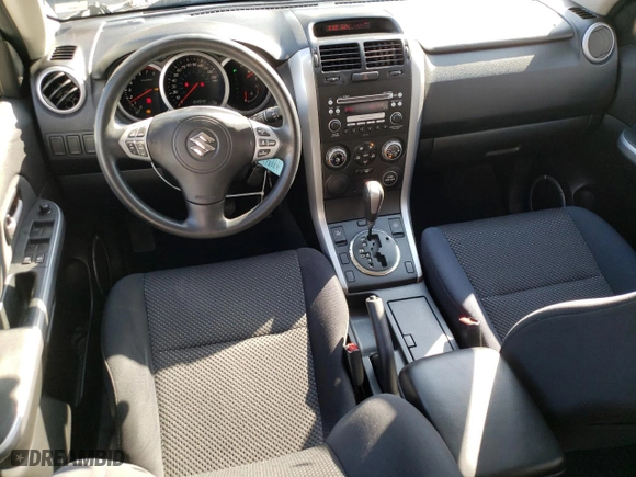 2007 Suzuki Grand Vitara with VIN JS3TE941774201744, listed as a Copart auction lot 46479844 with 104,948 mi miles and Salvage Title. Bid and sale history available at carsss.com. Image 8.