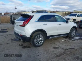 2022 Cadillac XT4 AWD Premium Luxury with VIN 1GYFZDR49NF105003, listed as a IAAI auction lot 41009382 with 43,395 mi miles and . Bid and sale history available at carsss.com. Image 4.