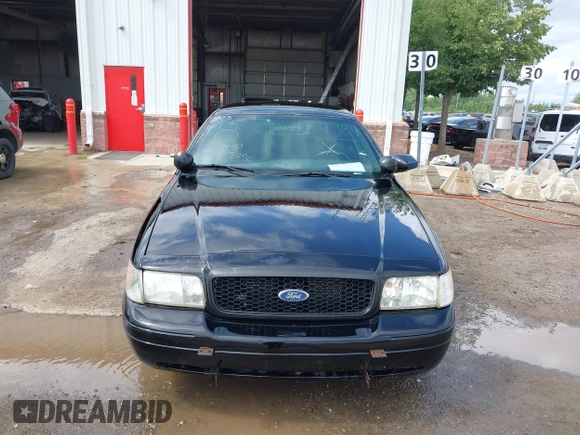 2005 Ford Police Interceptor z VIN 2FAHP71WX5X154384, wystawiony jako IAAI lot #40735796 z przebiegiem 84 143 mil mil oraz . Historia ofert i sprzedaży dostępna na DreamBid. Obrazek 12.