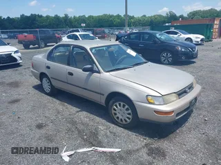 1994 Toyota Corolla Deluxe z VIN 2T1AE09B5RC069540, wystawiony jako IAAI lot #42552445 z przebiegiem 127 011 mil mil oraz . Historia ofert i sprzedaży dostępna na DreamBid. Obrazek 1.