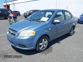 2007 Chevrolet Aveo LT with VIN KL1TG56677B049297, listed as a IAAI auction lot 42517516 with 163,130 mi miles and . Bid and sale history available at DreamBid. Image 2.