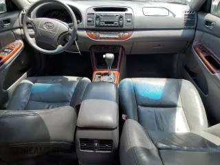 2006 Toyota Camry LE z VIN 4T1BF30K16U630147, wystawiony jako Copart lot #59696815 z przebiegiem 168 727 mil mil oraz Czysty tytuł • Clean title. Historia ofert i sprzedaży dostępna na DreamBid. Obrazek 8.