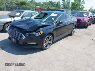 2017 Ford Fusion Titanium with VIN 3FA6P0K9XHR117300, listed as a IAAI auction lot 42731703 with 47,276 mi miles and . Bid and sale history available at DreamBid. Image 2.