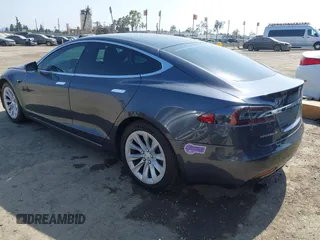 2019 Tesla Model S 75D with VIN 5YJSA1E25KF304371, listed as a IAAI auction lot 42349856 with 64,788 mi miles and . Bid and sale history available at DreamBid. Image 3.