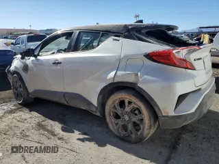 2021 Toyota C-HR LE with VIN JTNKHMBX3M1109664, listed as a Copart auction lot 87967165 with 84,688 mi miles and Salvage Title. Bid and sale history available at DreamBid. Image 2.