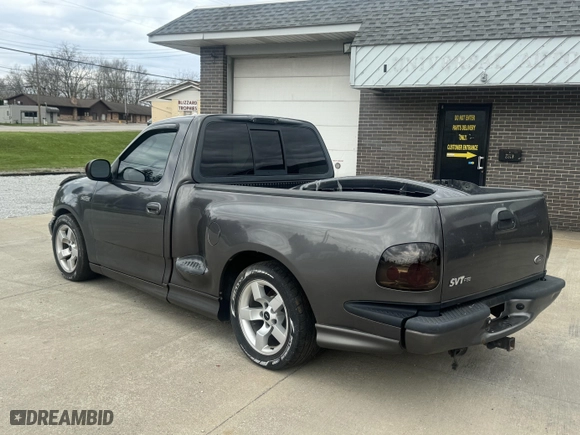 2003 Ford F-150 Lightning with VIN 2FTRF073X3CA56501, listed as a IAAI auction lot 42083560 with 112,754 mi miles. Bid and sale history available at carsss.com. Image 3.