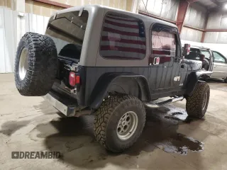 2005 Jeep Wrangler Rubicon with VIN 1J4FA69S85P368210, listed as a Copart auction lot 73425664 with 123,297 mi miles and Salvage Title. Bid and sale history available at carsss.com. Image 3.