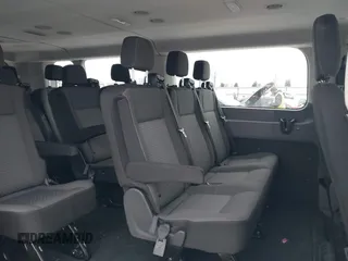 2024 Ford Transit Passenger XL with VIN 1FBAX2Y82RKA81076, listed as a IAAI auction lot 41632808 with 12,438 mi miles and . Bid and sale history available at DreamBid. Image 8.