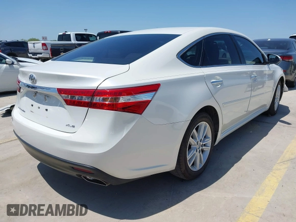 2014 Toyota Avalon Limited with VIN 4T1BK1EB2EU083624, listed as a IAAI auction lot 41963742 with 94,140 mi miles. Bid and sale history available at carsss.com. Image 4.