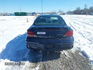 2004 Pontiac Grand Am SE with VIN 1G2NE52F24M692805, listed as a IAAI auction lot 41591014 with 137,072 mi miles. Bid and sale history available at carsss.com. Image 16.