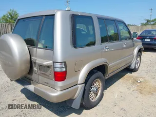 2002 Isuzu Trooper S with VIN JACDJ58X527J09916, listed as a IAAI auction lot 42603637 with 177,237 mi miles and . Bid and sale history available at DreamBid. Image 4.
