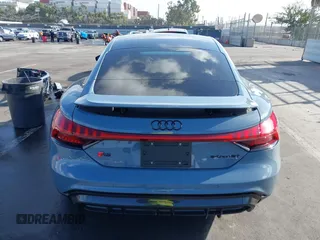 2023 Audi RS e-tron GT z VIN WAUBHBFWXP7903277, wystawiony jako IAAI lot #41098544 z przebiegiem 5781 mil mil oraz . Historia ofert i sprzedaży dostępna na DreamBid. Obrazek 16.