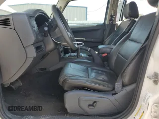 2010 Jeep Commander Sport with VIN 1J4RH4GK9AC157468, listed as a Copart auction lot 71022274 with 150,054 mi miles and Clean Title. Bid and sale history available at carsss.com. Image 7.