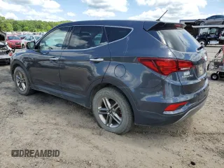 2018 Hyundai Santa Fe 2.4L z VIN 5XYZTDLB4JG521026, wystawiony jako Copart lot #56563175 z przebiegiem 173 170 mil mil oraz Czysty tytuł • Clean title. Historia ofert i sprzedaży dostępna na DreamBid. Obrazek 2.