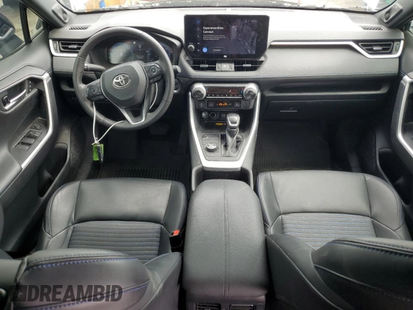 2024 Toyota RAV4 Hybrid XSE with VIN 4T3E6RFV0RU141591, listed as a Copart auction lot 59623085 with 27,682 mi miles and Salvage title. Bid and sale history available at DreamBid. Image 8.