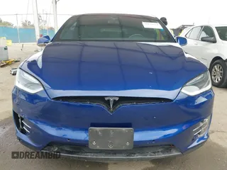 2016 Tesla Model X 70D z VIN 5YJXCBE29GF018794, wystawiony jako IAAI lot #42129574 z przebiegiem 51 814 mil mil oraz . Historia ofert i sprzedaży dostępna na DreamBid. Obrazek 12.
