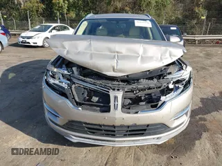 2015 Lincoln MKC z VIN 5LMCJ1A93FUJ26649, wystawiony jako IAAI lot #41832976 z przebiegiem 215 692 mil mil oraz . Historia ofert i sprzedaży dostępna na DreamBid. Obrazek 6.