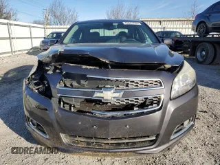 2013 Chevrolet Malibu LTZ with VIN 1G11H5SA6DF199549, listed as a Copart auction lot 49041735 with 130,367 mi miles and Salvage Title. Bid and sale history available at DreamBid. Image 5.
