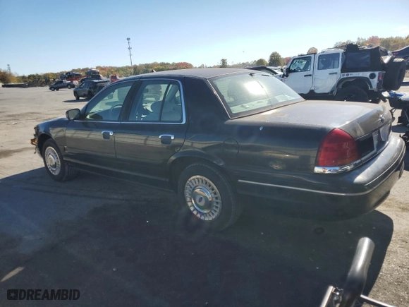 2001 Ford Crown Victoria Police Pkg Police Interceptor with VIN 2FAFP71W41X205475, listed as a Copart auction lot 75265194 with 117,633 mi miles and Salvage Title. Bid and sale history available at carsss.com. Image 2.