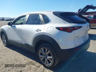2021 Mazda CX-30 Select with VIN 3MVDMABL3MM239692, listed as a IAAI auction lot 41354738 with 48,928 mi miles and . Bid and sale history available at DreamBid. Image 3.