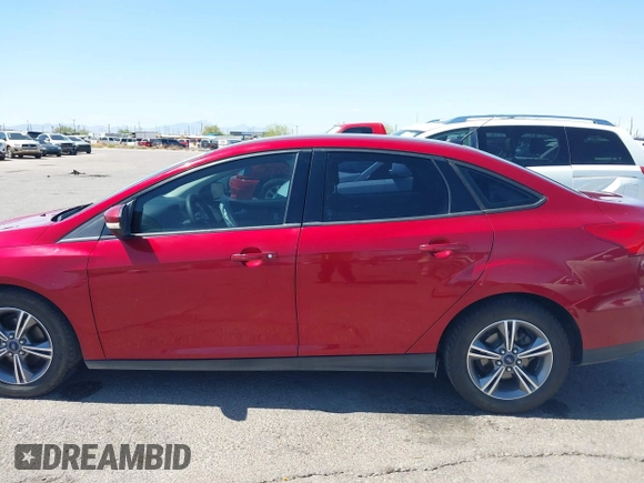 2017 Ford Focus SE with VIN 1FADP3FE3HL206074, listed as a IAAI auction lot 42594911 with 143,814 mi miles and . Bid and sale history available at DreamBid. Image 14.