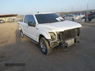 2019 Ford F-150 XL with VIN 1FTEW1E49KKF01322, listed as a IAAI auction lot 41792104 with 84,930 mi miles. Bid and sale history available at carsss.com. Image 1.