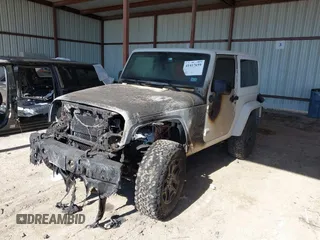 2015 Jeep Wrangler Altitude z VIN 1C4GJWBG2FL714146, wystawiony jako IAAI lot #41417659 z przebiegiem Nie podano mil oraz . Historia ofert i sprzedaży dostępna na DreamBid. Obrazek 2.