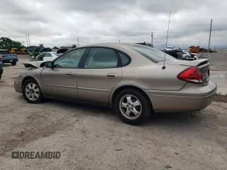 2005 Ford Taurus SE with VIN 1FAFP53205A252967, listed as a Copart auction lot 58449495 with Not provided miles and Salvage title. Bid and sale history available at DreamBid. Image 2.