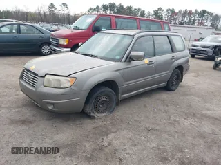 2006 Subaru Forester 2.5 X w/Premium Pkg with VIN JF1SG656X6H705960, listed as a IAAI auction lot 41872470 with 228,095 mi miles. Bid and sale history available at carsss.com. Image 2.