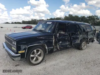 1989 Chevrolet Suburban with VIN 1GNER16K9KF194688, listed as a Copart auction lot 71224134 with 52,002 mi miles and Salvage Title. Bid and sale history available at carsss.com. Image 1.
