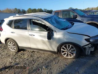2018 Nissan Rogue S with VIN KNMAT2MT1JP597051, listed as a IAAI auction lot 41814178 with 181,563 mi miles and . Bid and sale history available at carsss.com. Image 13.