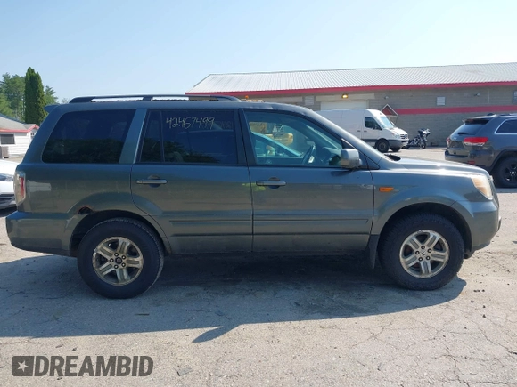 2007 Honda Pilot EX-L z VIN 2HKYF18677H504266, wystawiony jako IAAI lot #42467499 z przebiegiem 214 717 mil mil oraz . Historia ofert i sprzedaży dostępna na DreamBid. Obrazek 14.