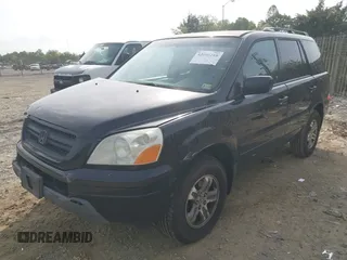 2005 Honda Pilot EX-L with VIN 5FNYF18575B046635, listed as a IAAI auction lot 42096210 with 222,490 mi miles and . Bid and sale history available at carsss.com. Image 2.
