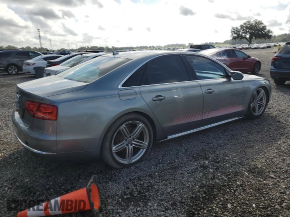 2013 Audi A8 3.0L with VIN WAUAGAFD6DN032313, listed as a Copart auction lot 65157945 with 100,194 mi miles and Clean title. Bid and sale history available at DreamBid. Image 3.
