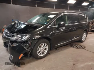 2020 Chrysler Pacifica Touring L with VIN 2C4RC1BG2LR280156, listed as a IAAI auction lot 42182406 with 105,038 mi miles and . Bid and sale history available at DreamBid. Image 2.
