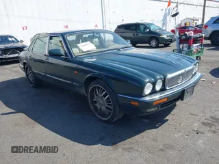 1995 Jaguar XJ with VIN SAJHX1741SC720469, listed as a IAAI auction lot 42100831 with 112,859 mi miles and . Bid and sale history available at DreamBid. Image 1.