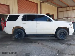 2016 Chevrolet Tahoe Commercial with VIN 1GNLCDEC4GR340344, listed as a IAAI auction lot 41639692 with 258,098 mi miles. Bid and sale history available at carsss.com. Image 13.